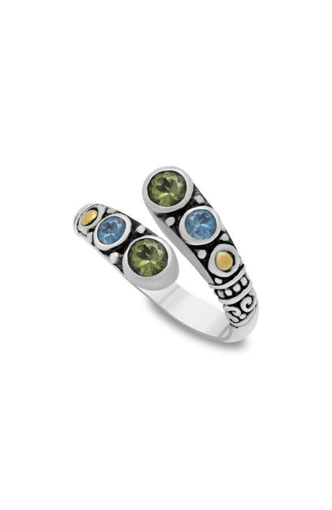Anillo Bypass Peridoto y Topacio Azul