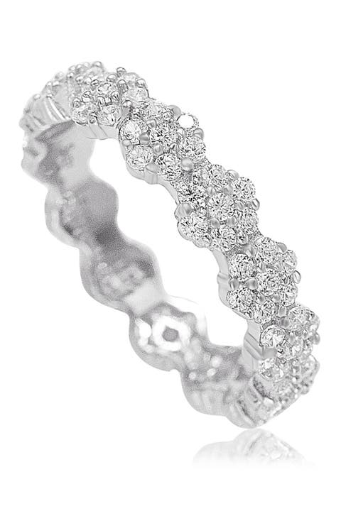 Anillo de plata de ley con circonita blanca y pavé de flores