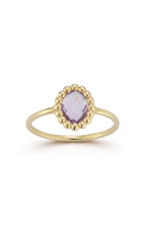 Anillo de oro de 14 quilates con topacio