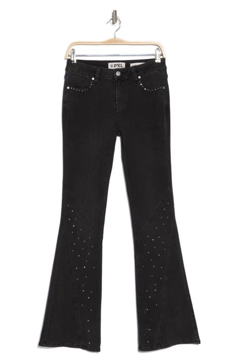 Vaqueros acampanados con tachuelas