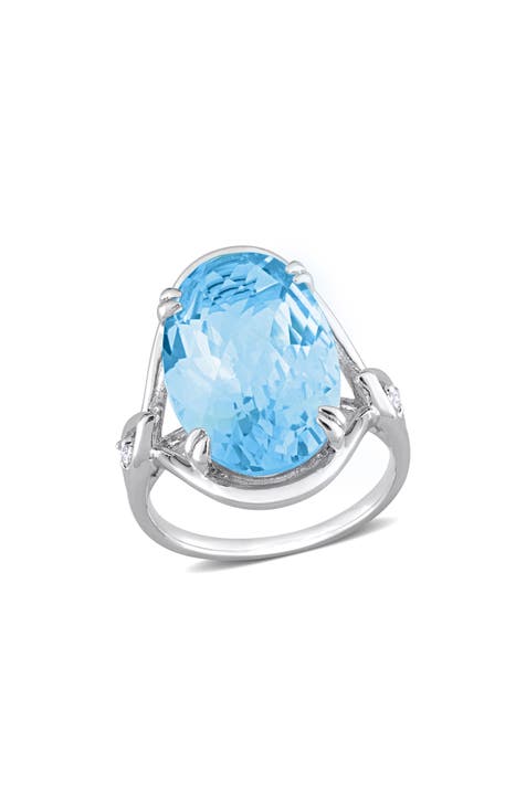 Anillo ovalado en damero de topacio azul