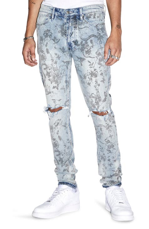 Jeans pitillo rasgados con estampado floral Van Winkle Unearthly
