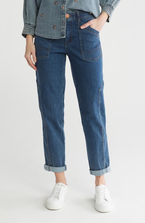 Vaqueros tapered con pernera recta y puños enrollados