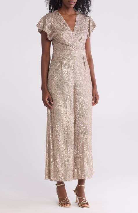 Mono con mangas acampanadas y lentejuelas