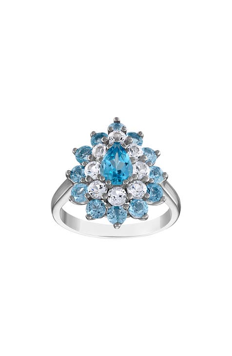 Anillo de plata de ley con doble halo de topacio azul suizo y zafiro blanco creado