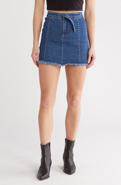 Minifalda vaquera con cinturón y tachuelas