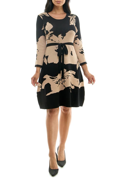 Vestido estilo suéter con vuelo y corte jacquard