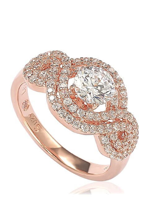 Anillo de compromiso con halo de circonitas cúbicas redondas de plata de ley chapada en rosa