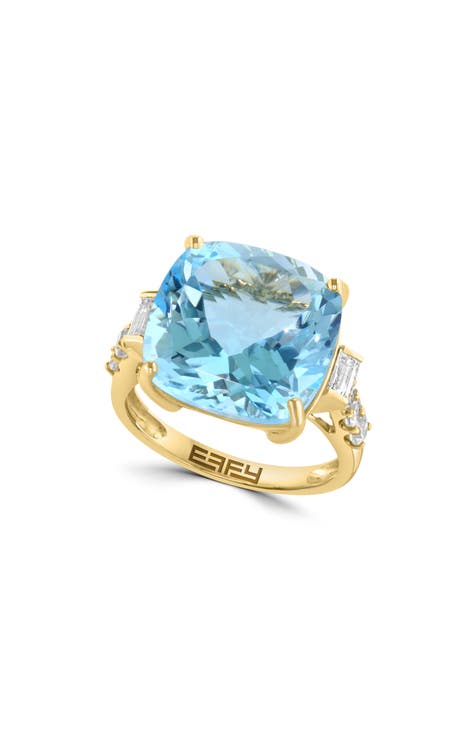 Anillo de oro amarillo de 14 quilates con topacio azul cielo y zafiro blanco talla cojín