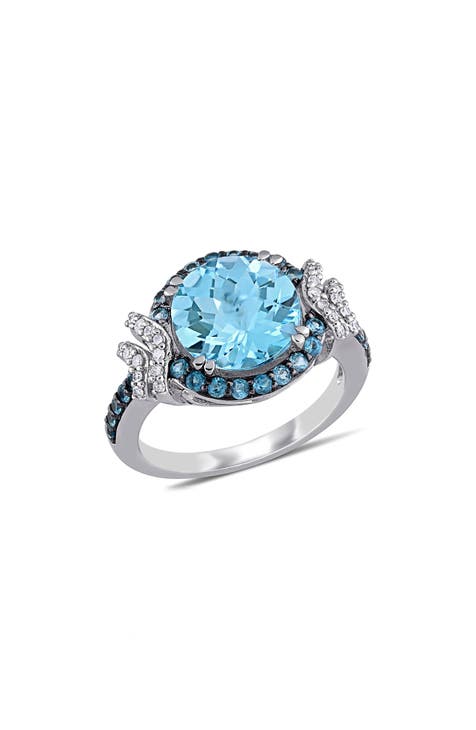 Anillo de plata de ley con topacio azul y diamantes