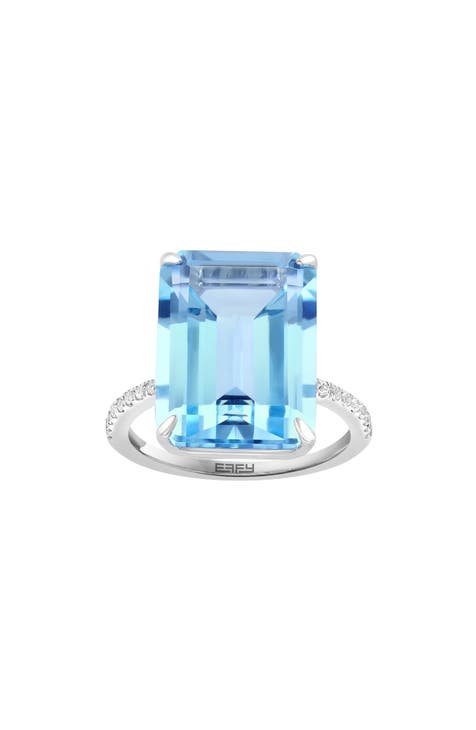 Anillo de plata de ley con topacio azul cielo