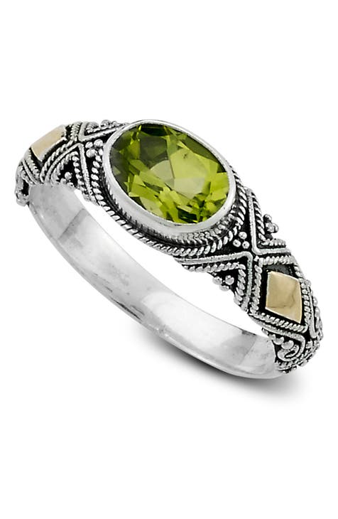 Anillo ovalado de peridoto en oro de 18 quilates y plata de ley