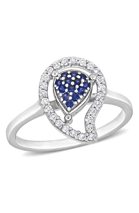 Anillo de plata de ley con pavé de topacio blanco y zafiro azul creado