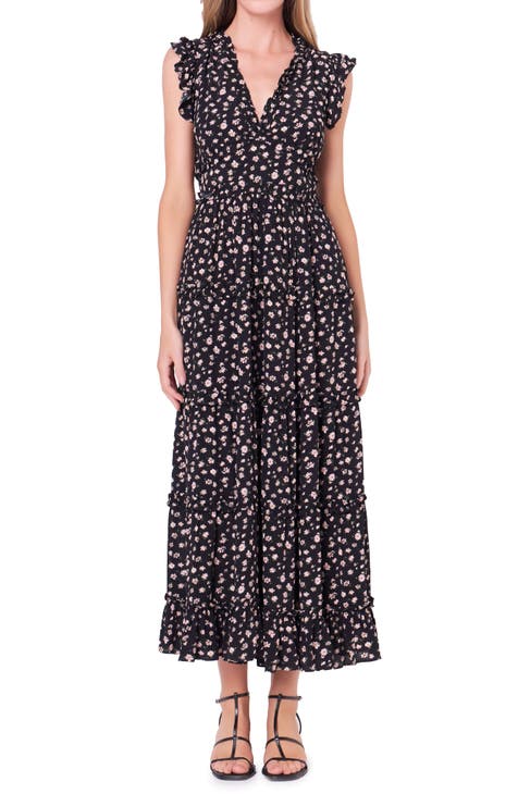 Vestido largo escalonado con manga japonesa y volantes florales