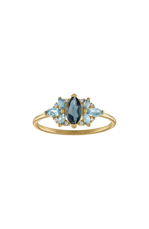 Anillo de diamantes y topacio azul