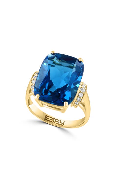 Anillo de oro amarillo de 14 quilates con topacio azul de Londres y diamantes - 0,14 ct.