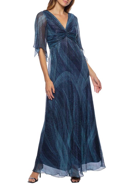 Vestido metalizado con mangas onduladas