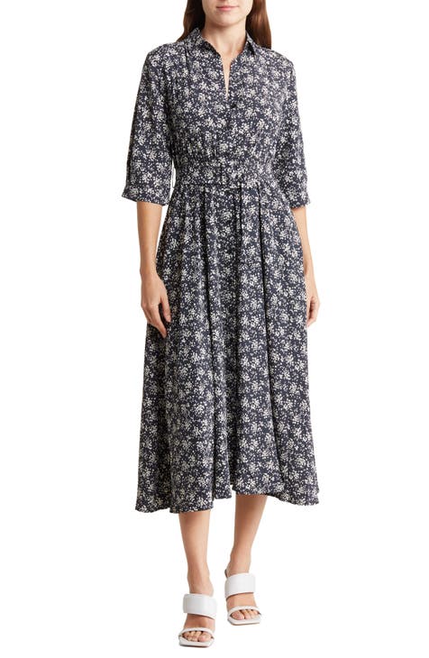 Vestido camisero midi entallado y con vuelo con cinturón