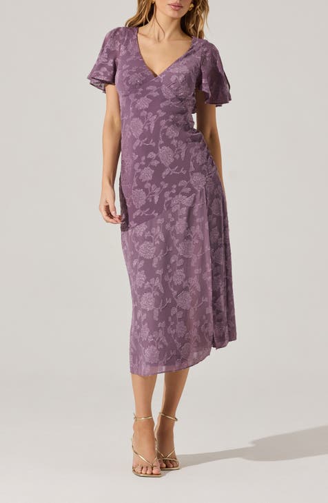 Vestido midi floral con mangas acampanadas y espalda recortada