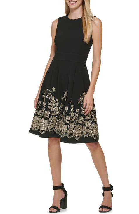 Vestido ajustado y con vuelo bordado