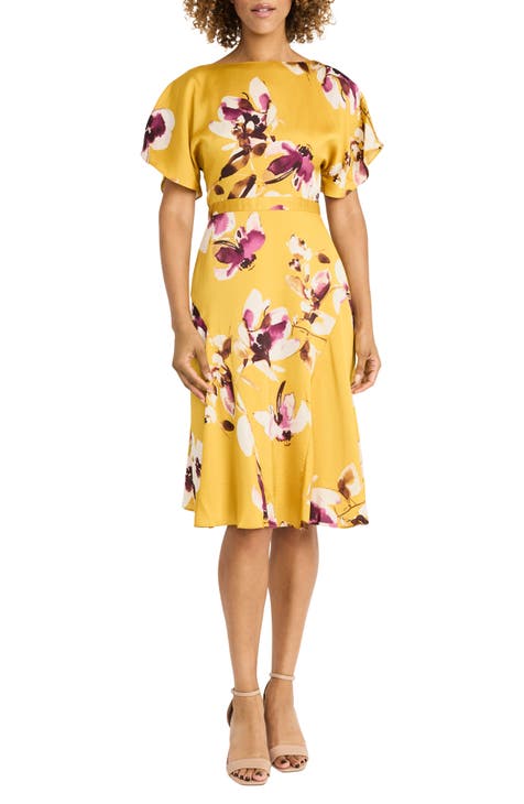 Vestido midi con mangas onduladas