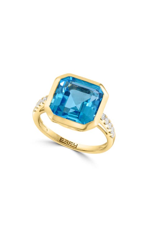 Anillo de Oro Amarillo de 14K con Topacio Azul y Diamante - 0.19ct. - Talla 7